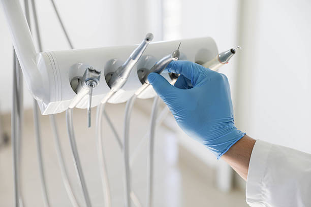 Professional Emergency Dentist technician working in Smithville, NJ
